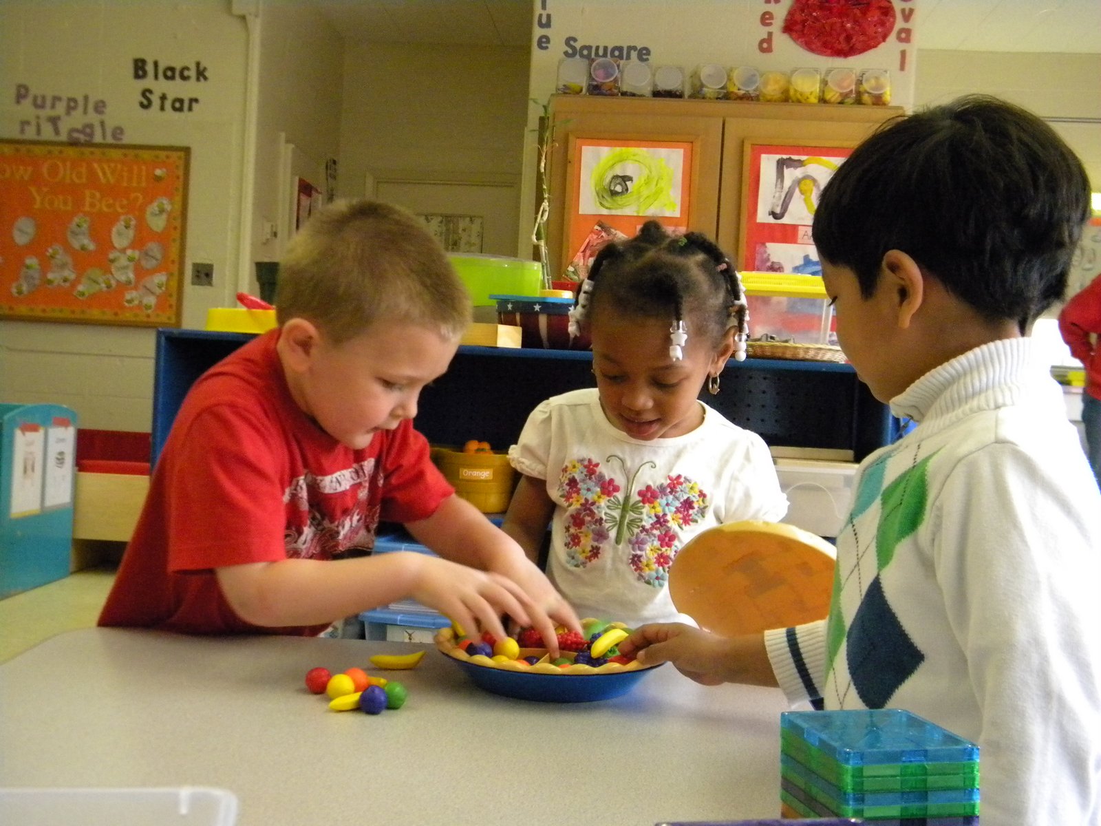 Playing a learning game at Little Panthers Preschool