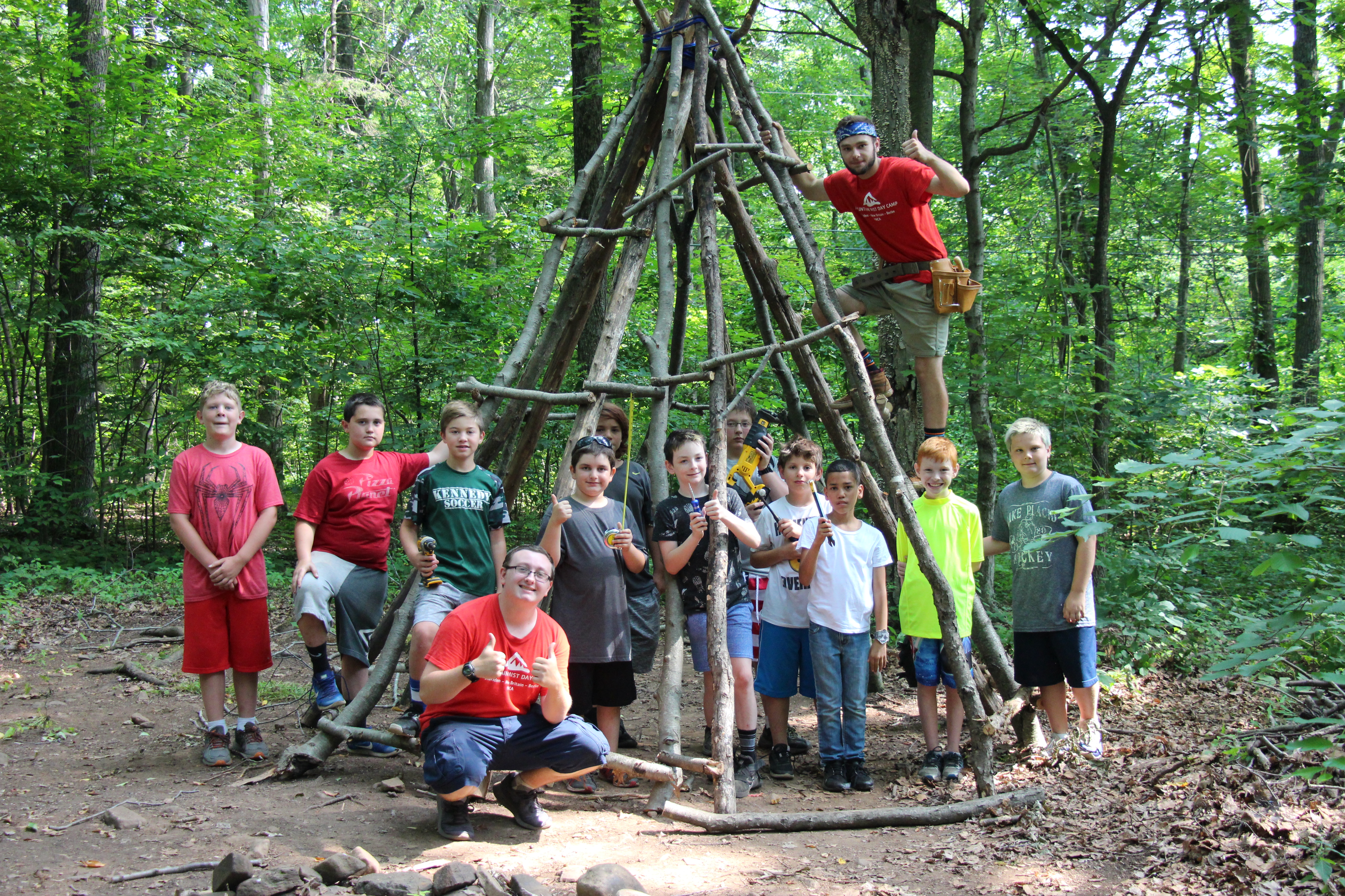 Mountain Mist Fort Building Campers with their tee pee structure they built 
