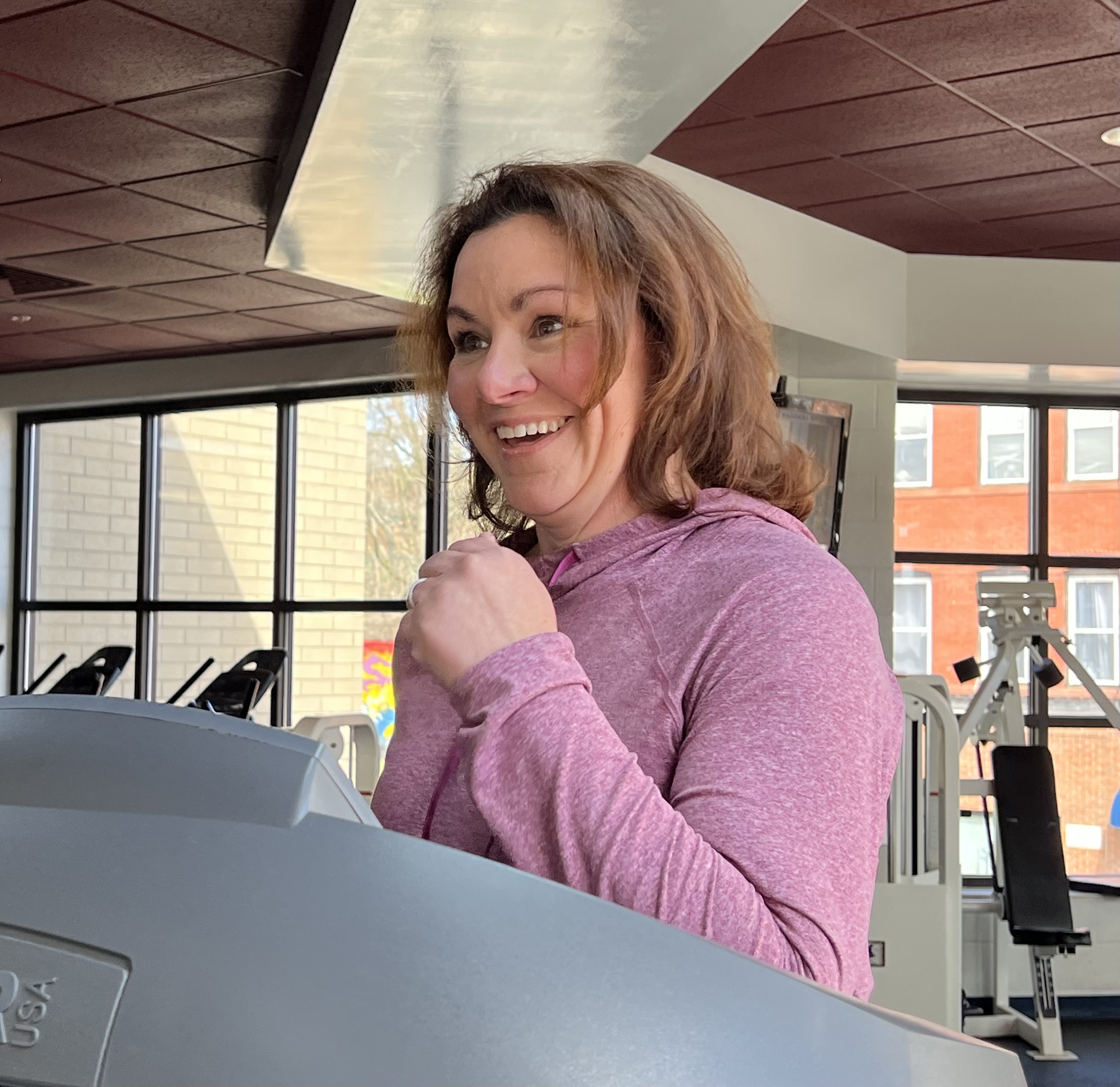 Member Janice Colandrea running on treadmill at Meriden YMCA fitness center